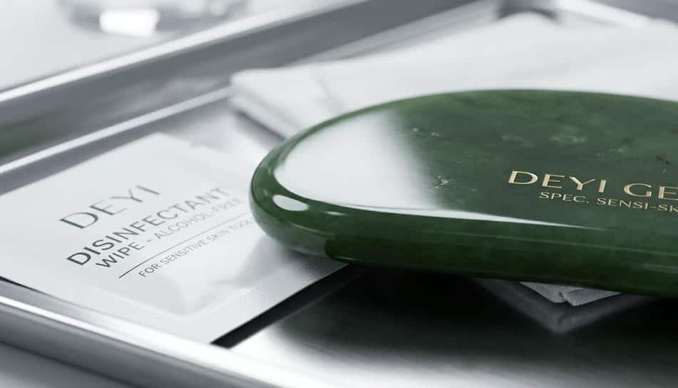 A close-up shot of a Gua Sha tool, featuring a perfectly polished and smooth surface.