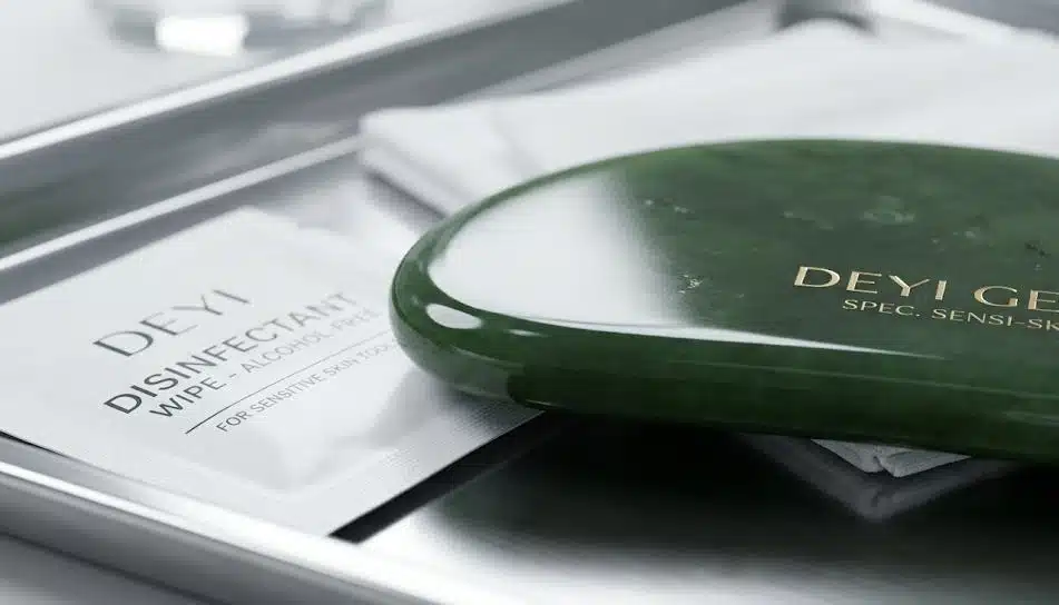 A close-up shot of a Gua Sha tool, featuring a perfectly polished and smooth surface.