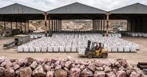 A large quantity of raw materials for gua sha were stored in the huge open-air warehouse.
